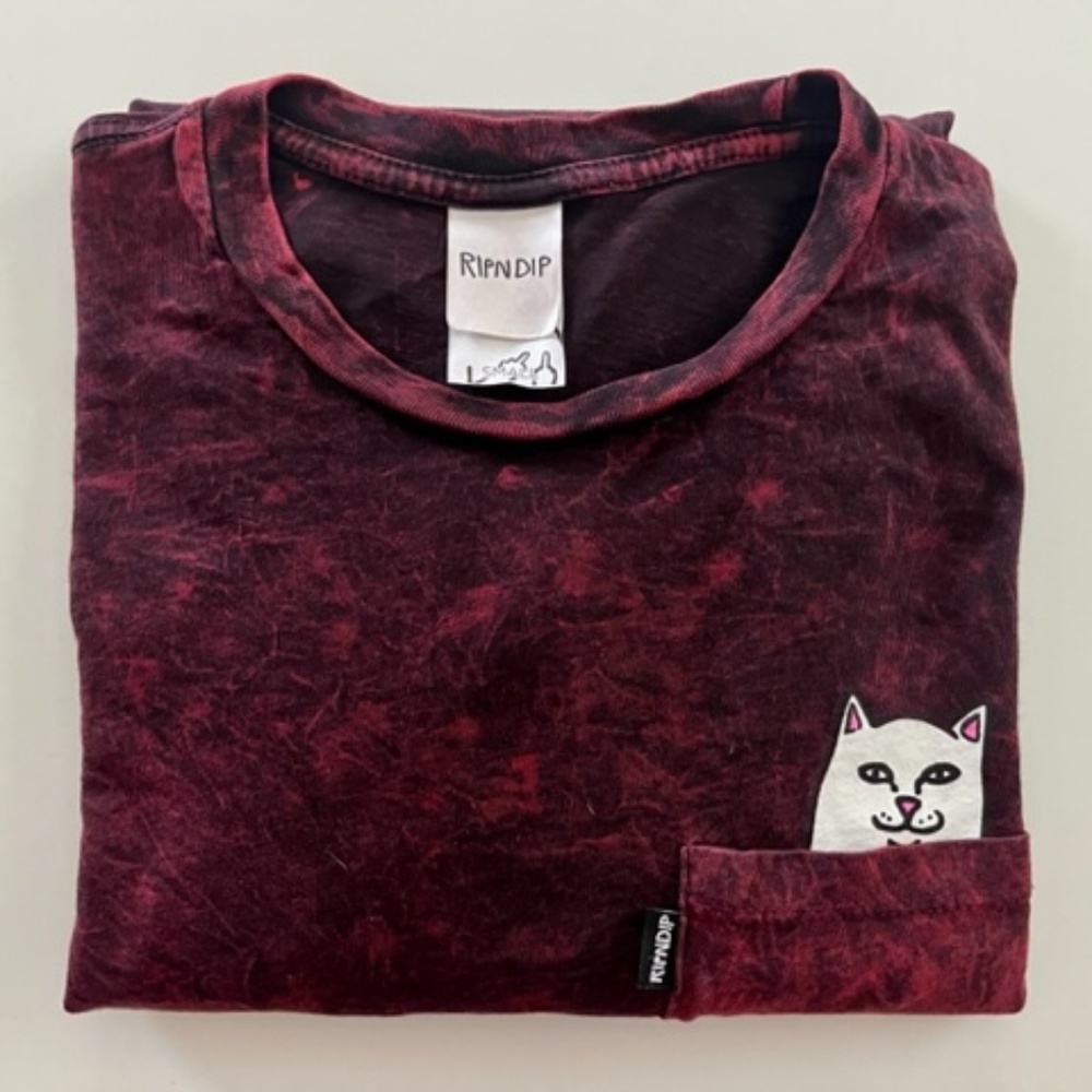Rip N Dip long sleeve red and black marble pattern shirt with hidden cat pocket.